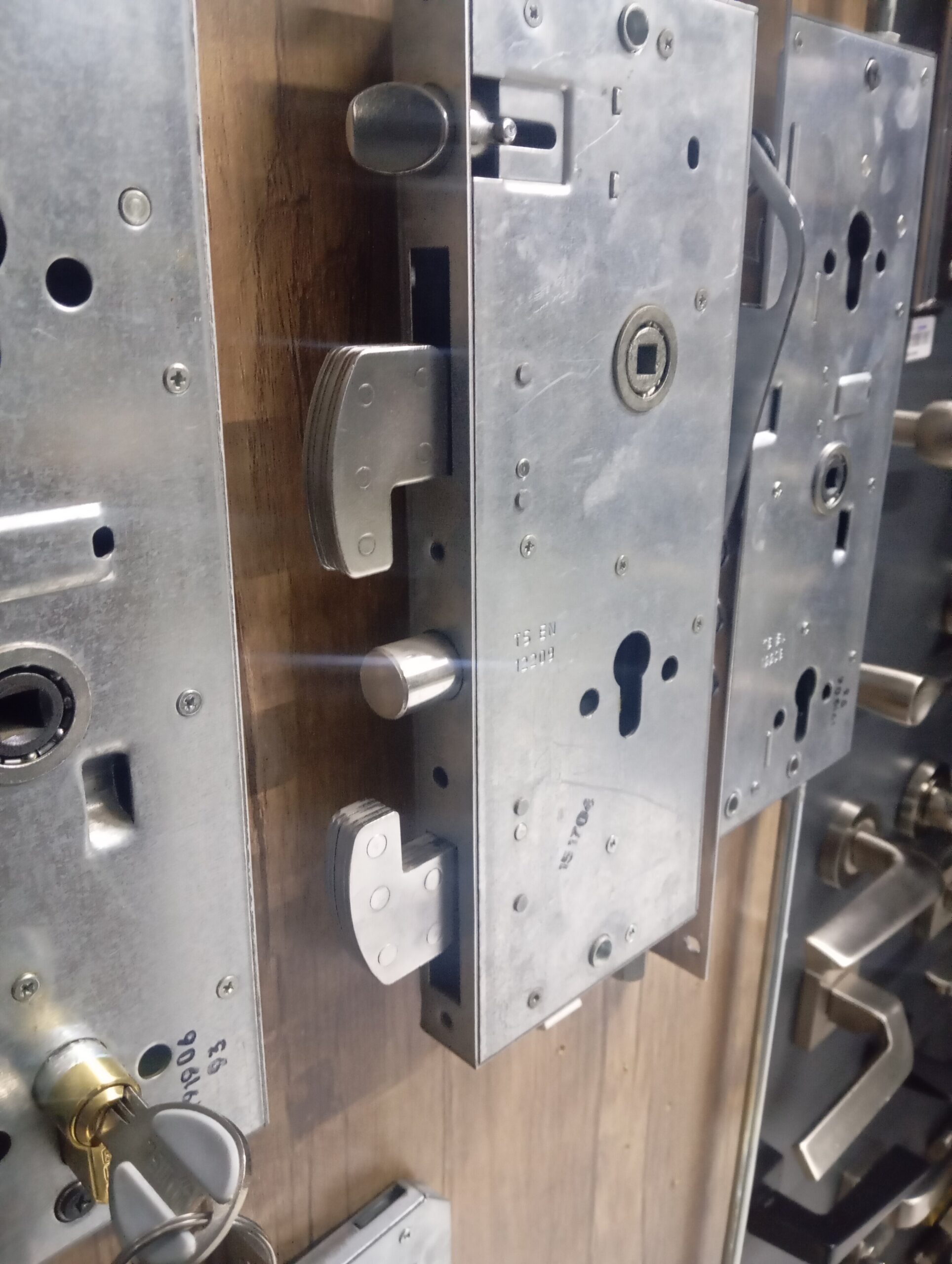 Professional locksmith installing lock correctly